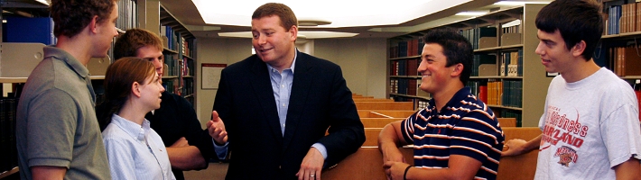 Students in Library Study Area with Executive Mentor